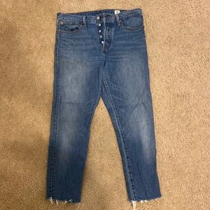 Levi’s, medium wash with button-fly